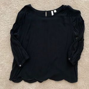 Scalloped black blouse